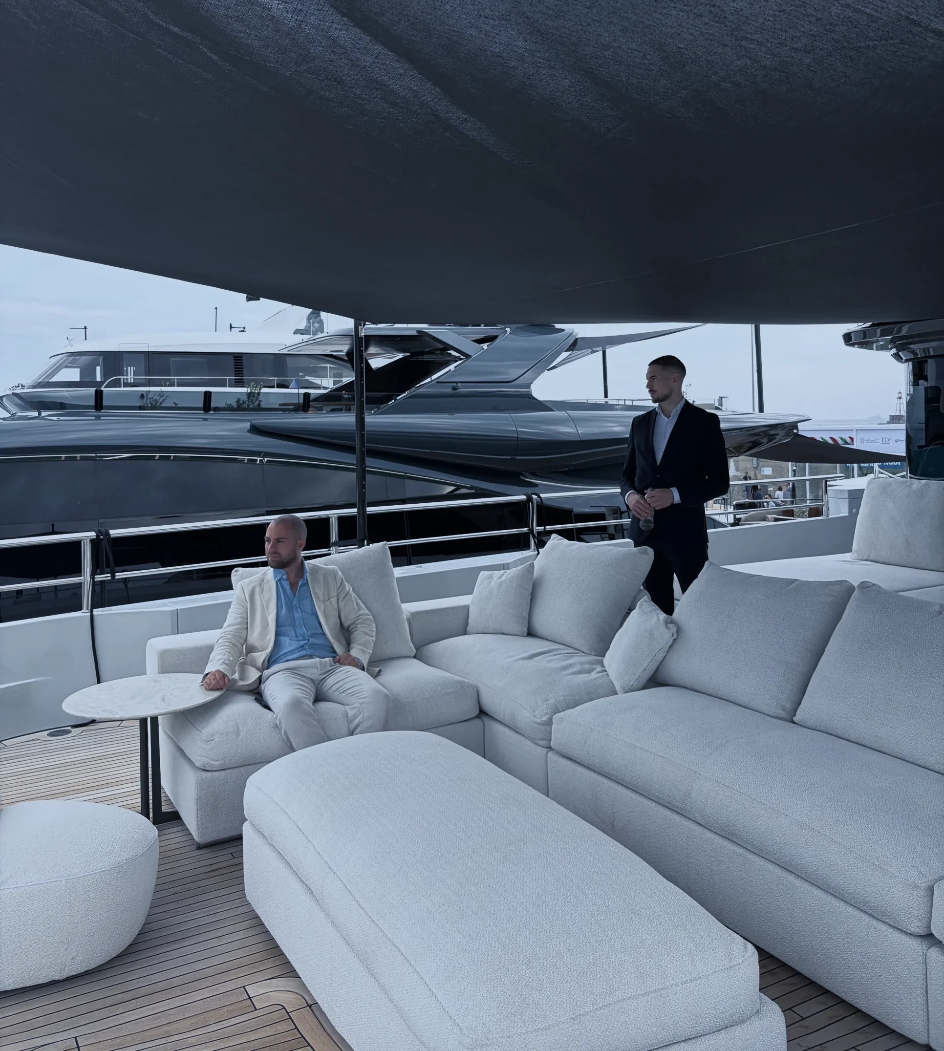 Nik and Jovan, the co-founders of Aurelia, on board a yacht